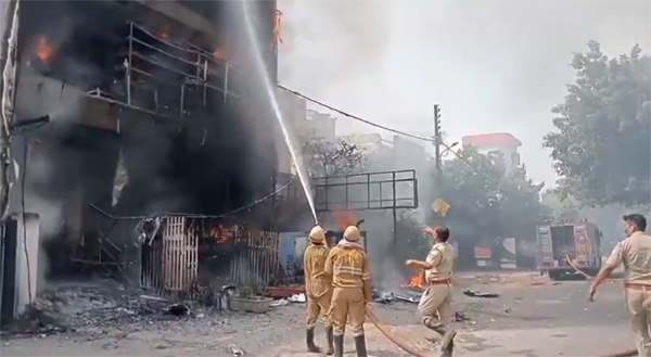 Fighting fire at coaching centre