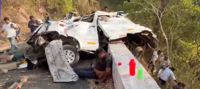 The wreckage of  a Kerala tourist van fallen into a Coimbatore gorge