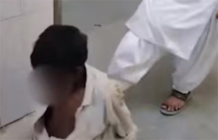 A hospital employee assaulting a helpless patient.