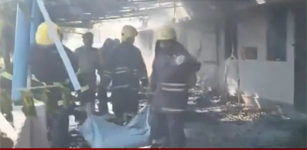 Dead bodies being removed from the site of the Virudhunagar firecracker blast.