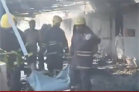 Dead bodies being removed from the site of the Virudhunagar firecracker blast.